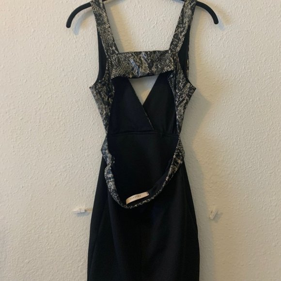 Mid length black & snake pattern dress. - Picture 2 of 2
